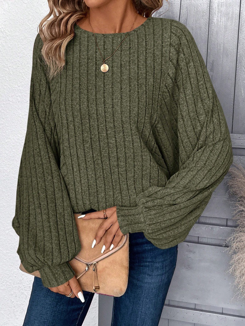 Dame sweater med elegante ballonærmer og ribbestruktur Stilla