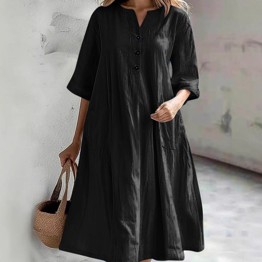 Dame afslappet midikjole med knaplukning og praktiske lommer Stilla