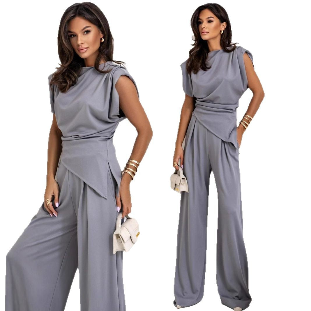Dame elegant jumpsuit med asymmetrisk snit og draperet overdel Stiila