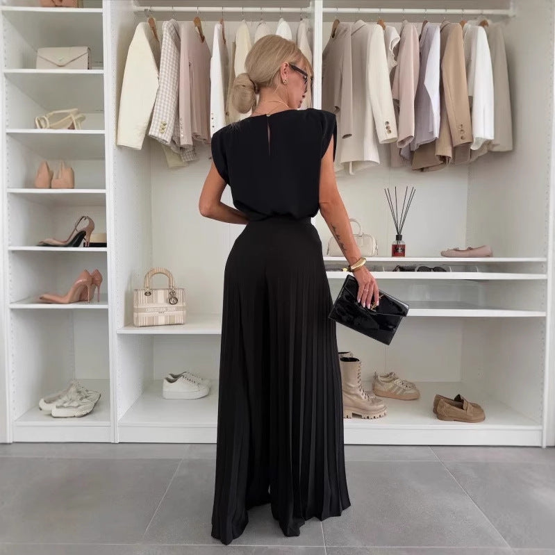 Dame jumpsuit med blomsterdesign og skulderpuder Stilla