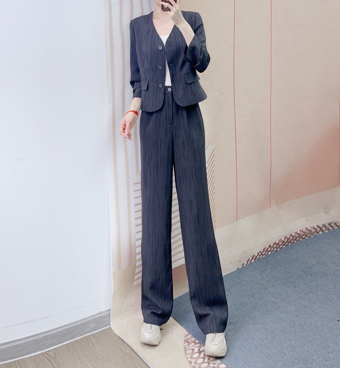 Dame elegant blazer-bukser sæt med smal pasform og dekorative knapdetaljer Stilla