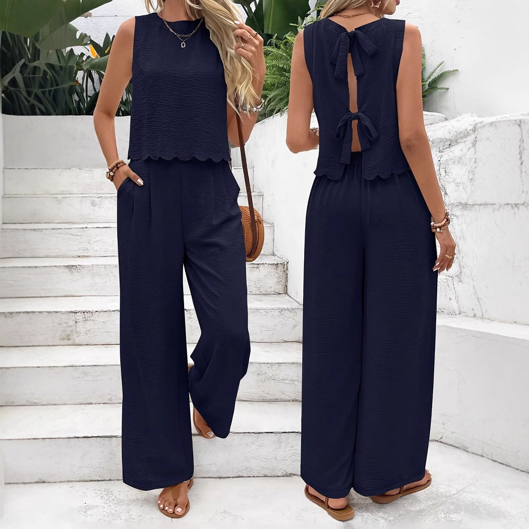 Dame jumpsuit med elegant bælte og bredt ben Stilla