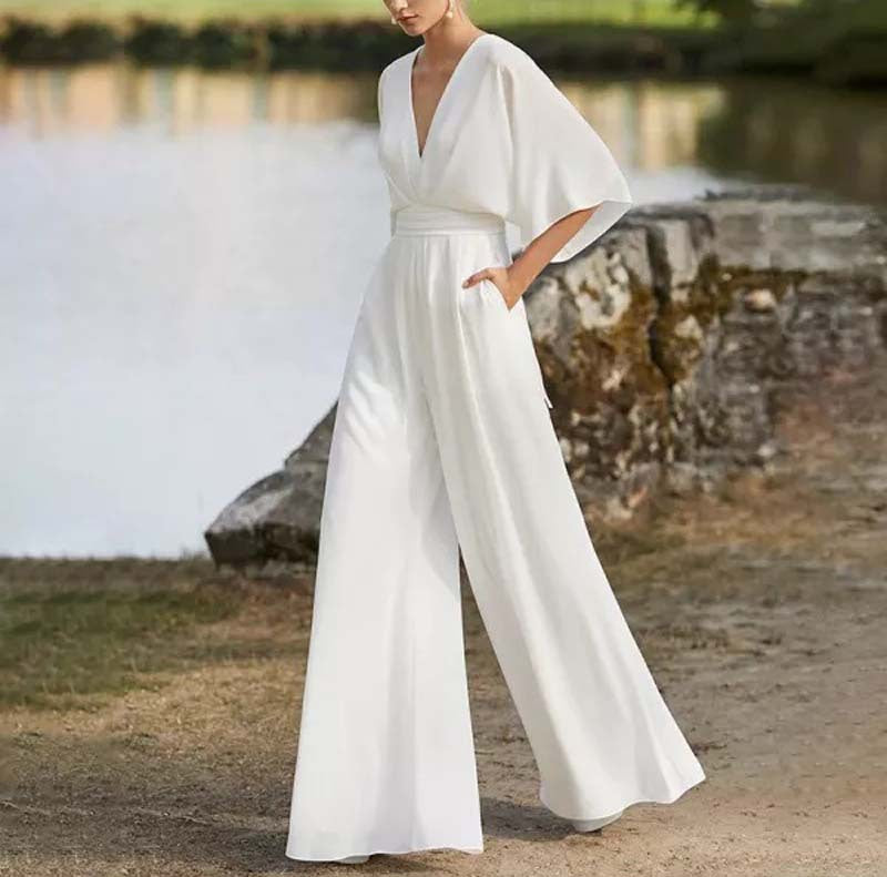 Dame Elegant Jumpsuit med dyb V-udskæring og flydende snit Stilla