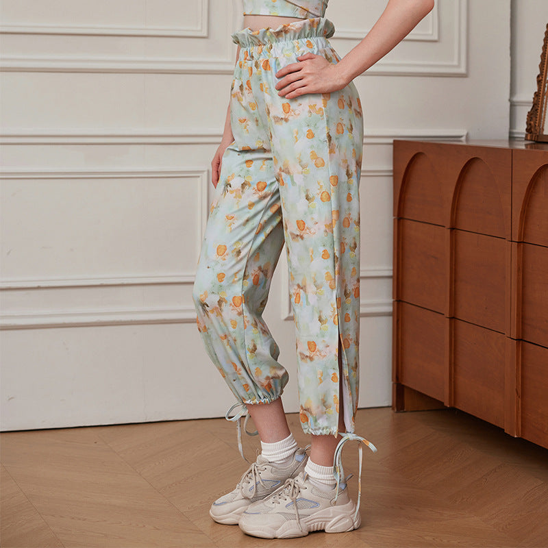 Dame afslappede fritidshavebukser med blomstret tryk og justerbar linning Stilla