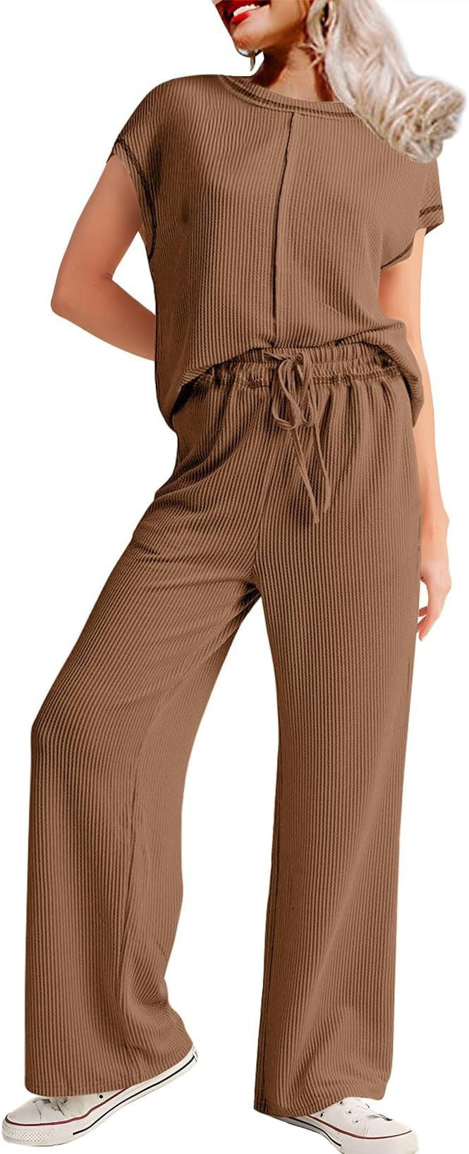 Dame afslappet jumpsuit med elegant ribdesign og bredt ben Stilla