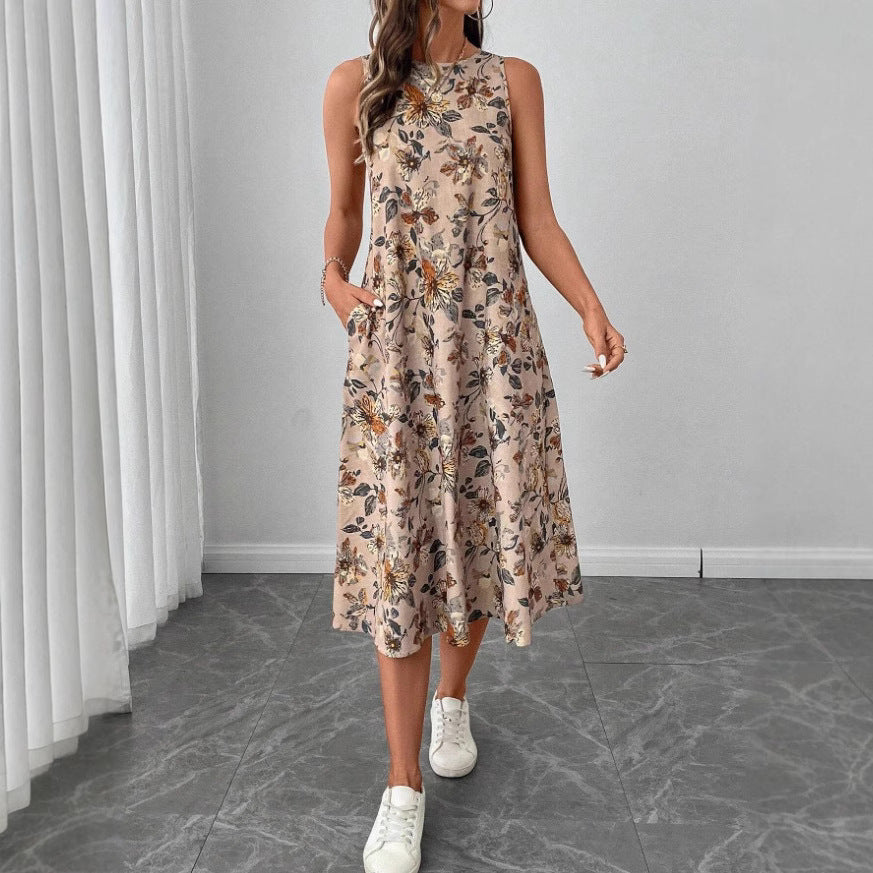 Dame afslappet blomsterkjole med lommer og svajende kant Stilla