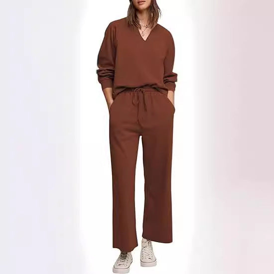 Damer komfortabel V-udskæring jumpsuit med bredt ben og elastisk talje Stilla