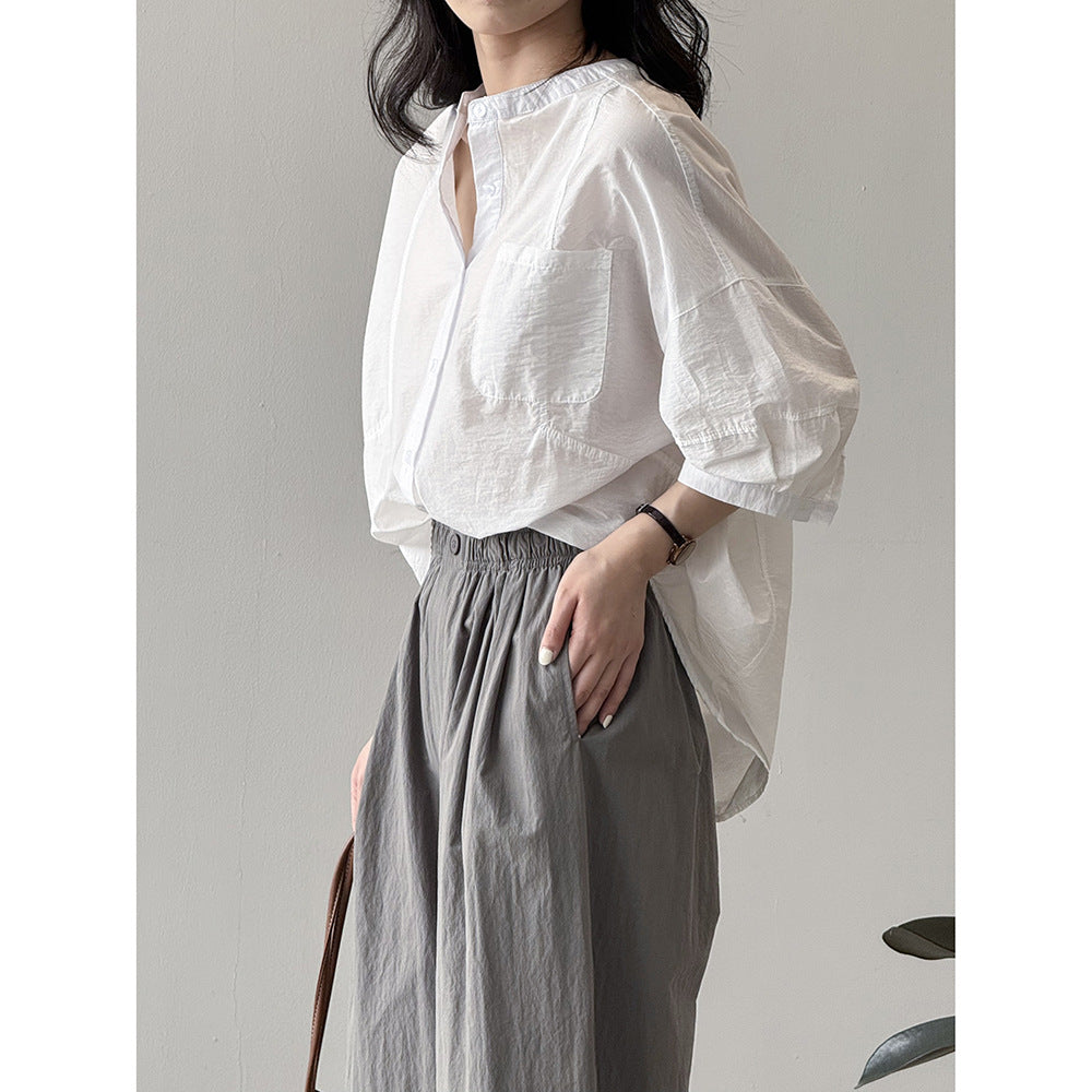 Dame afslappet langærmet blouse med knapbar udskæring og brystlomme Stilla