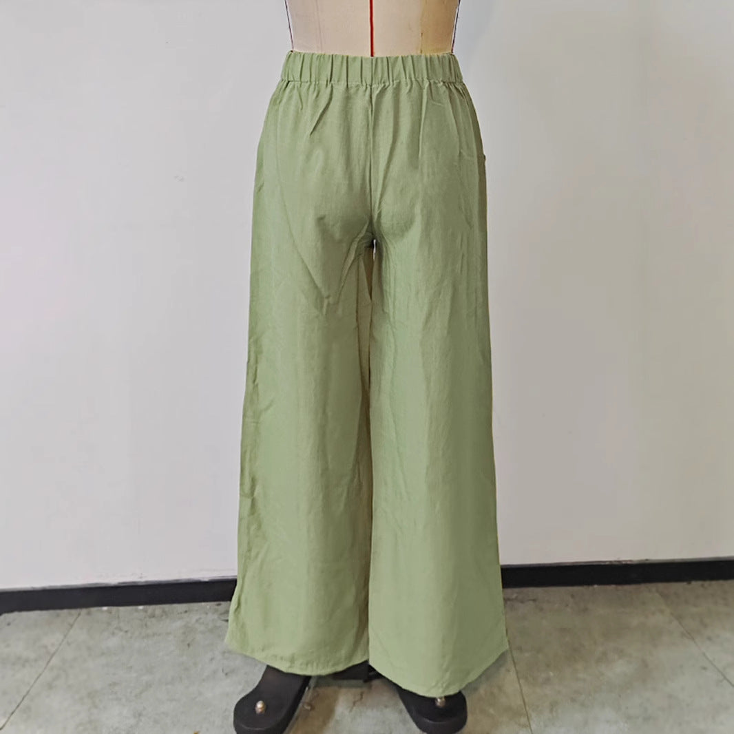 Dame afslappede Palazzo-bukser lavet af let, åndbart stof med elastisk talje Stilla