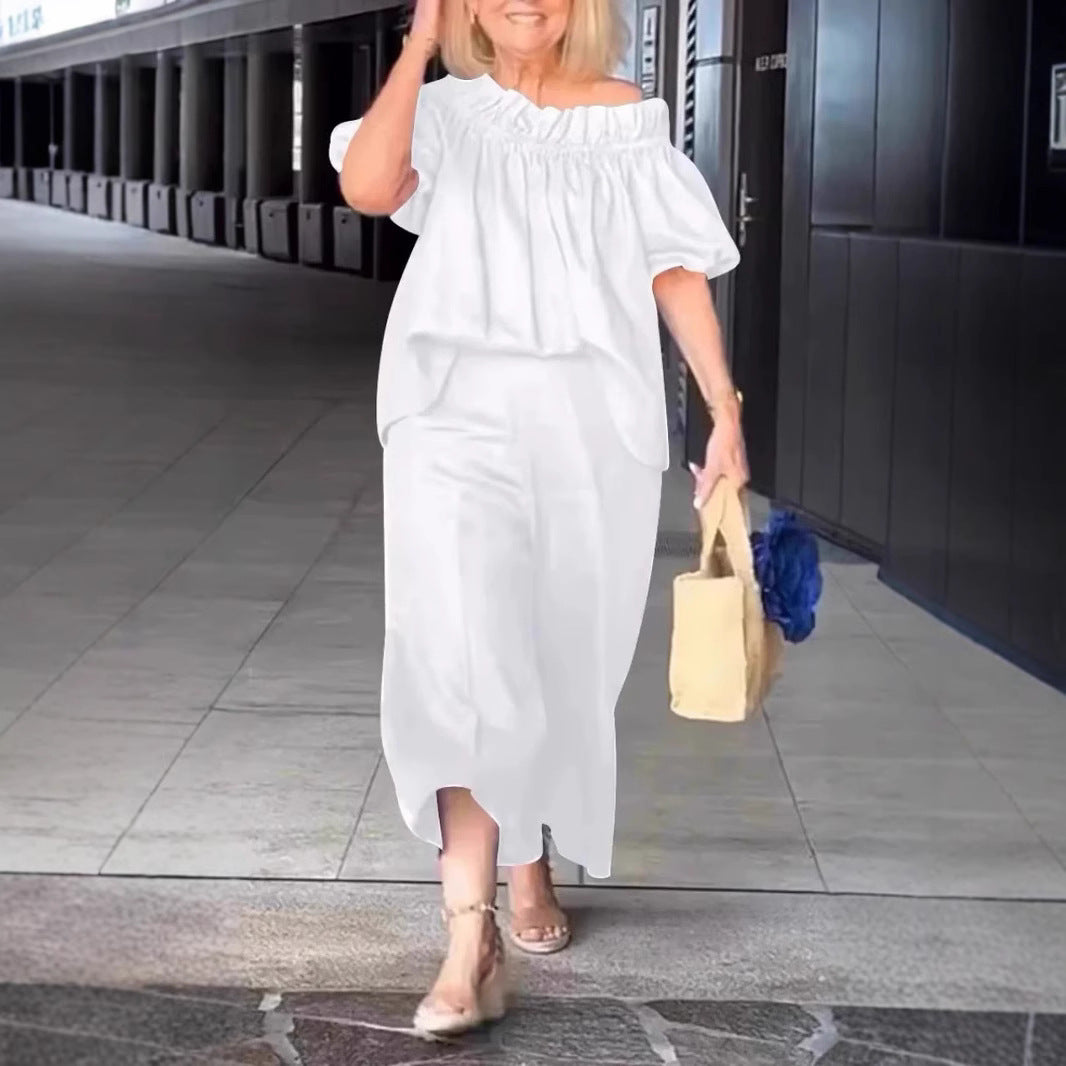 Dame luftig jumpsuit-sæt med voluminøse ærmer og raffineret taljering Stilla