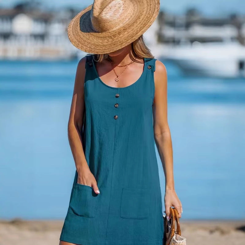 Dame afslappet strandkjole med praktiske lommer og knapdetaljer Stilla