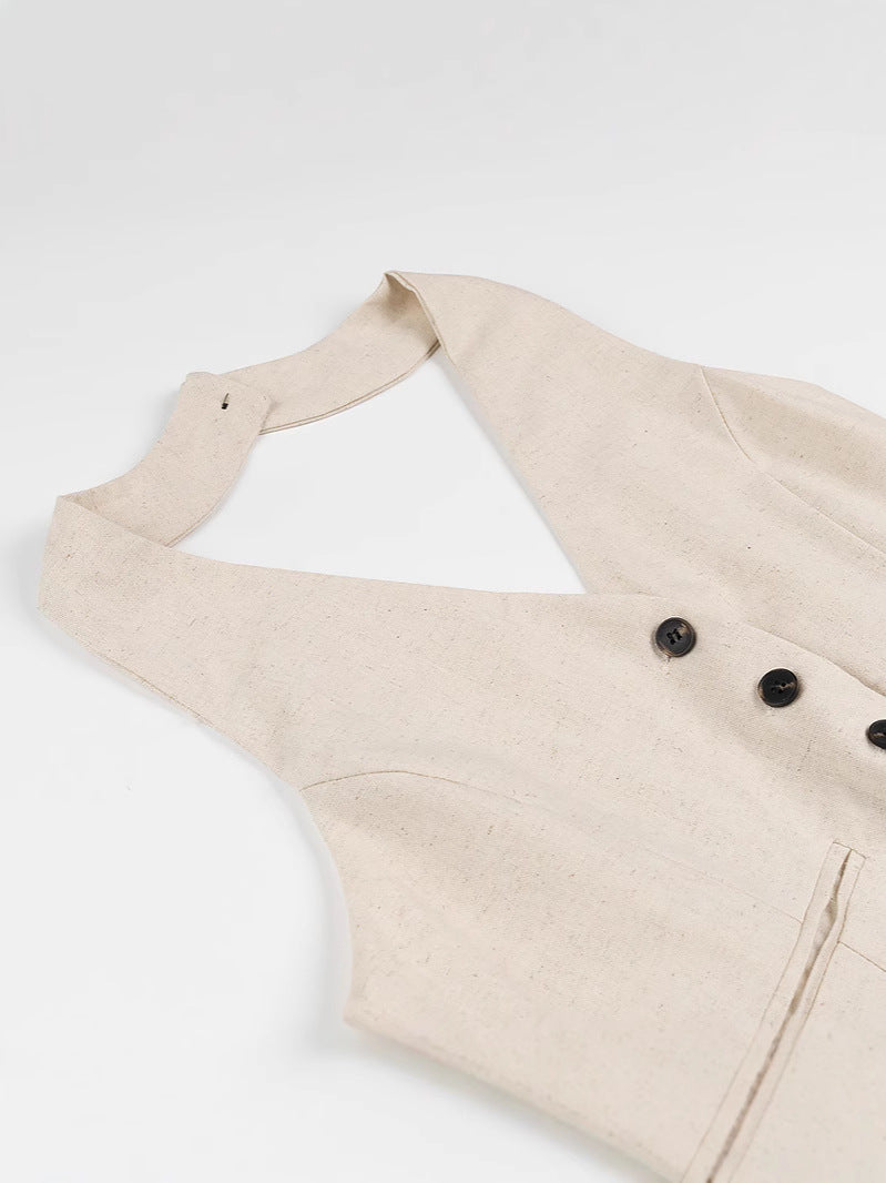 Dame jumpsuit med elegant V-udskæring og raffinerede knapdetaljer Stilla