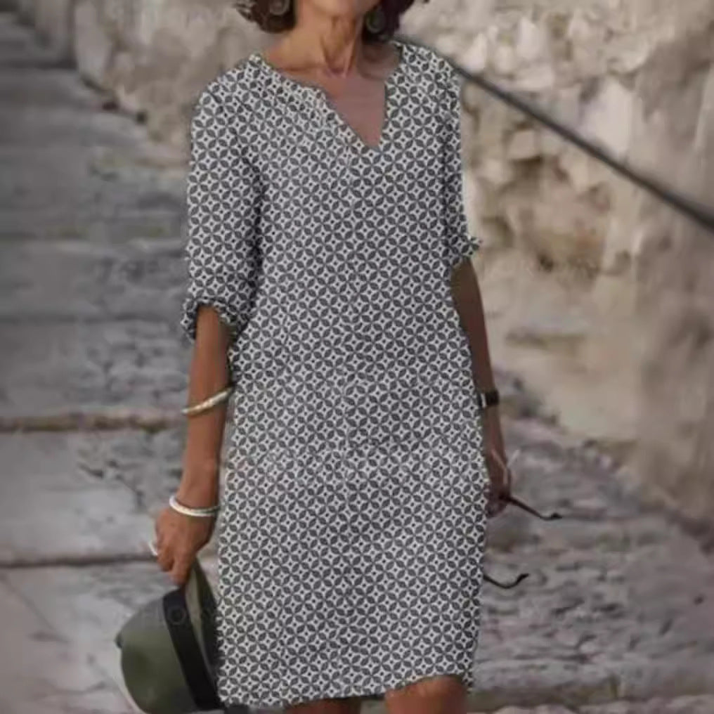 Dame afslappet skjortekjole med blomstermotiv og praktiske sidelommer Stilla