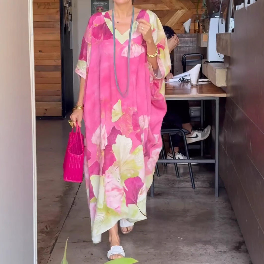 Dame Elegant kaftan-kjole med blomsterdesign og brede ærmer Stilla