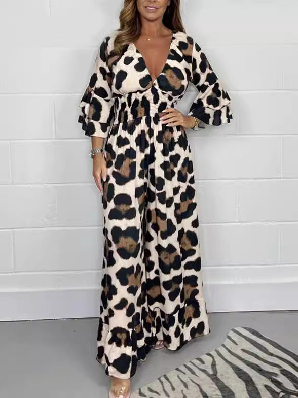 Dame Maxijumpsuit med elegant V-udskæring og flæseærmer Stilla