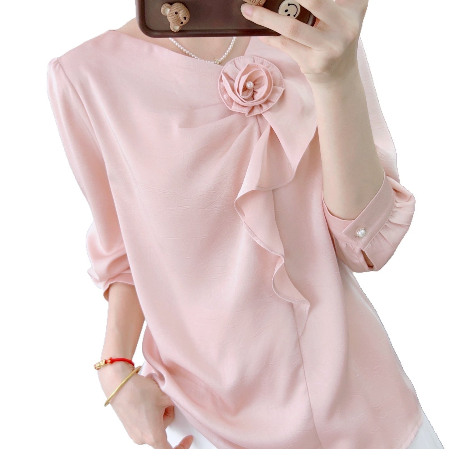 Dame elegant bluse med dekorative flæser og blomsterapplikation Stilla