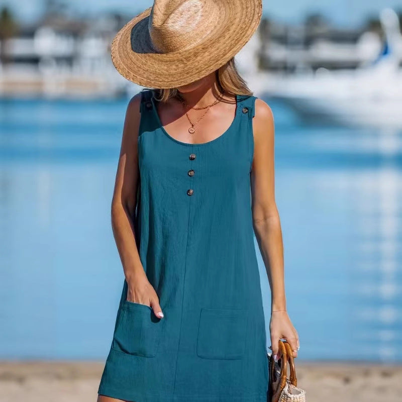 Dame afslappet strandkjole med praktiske lommer og knapdetaljer Stilla