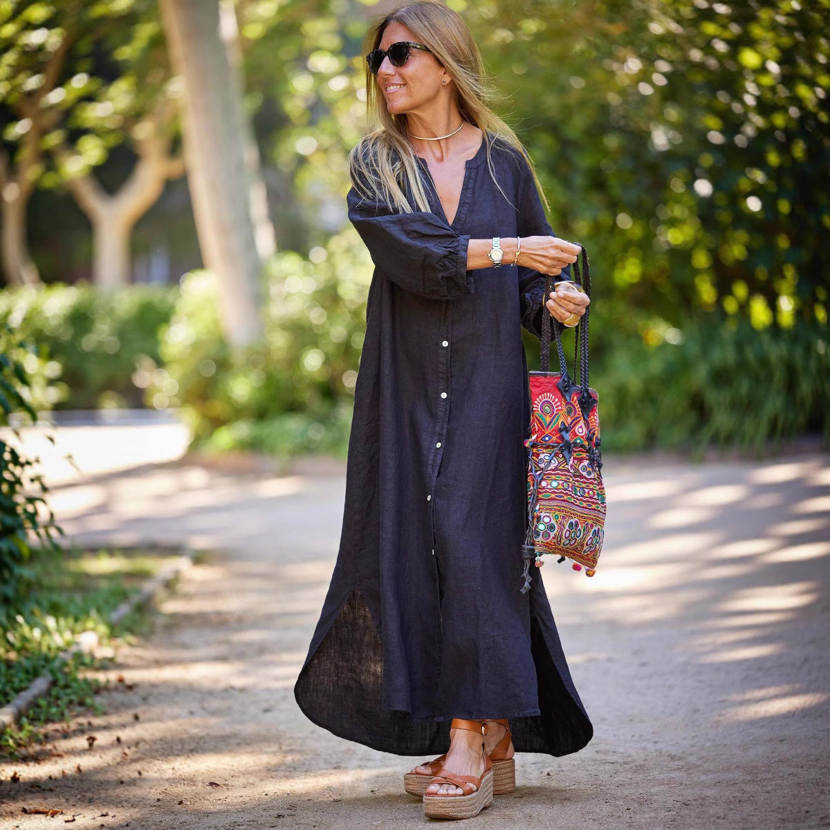 Dame afslappet langærmet kjole med knaplukning og ballonærmer Stilla