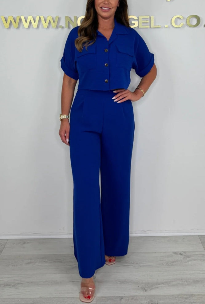 Dame Lagdelt Jumpsuit med Kortærmer og Dekorative Knapper Stilla