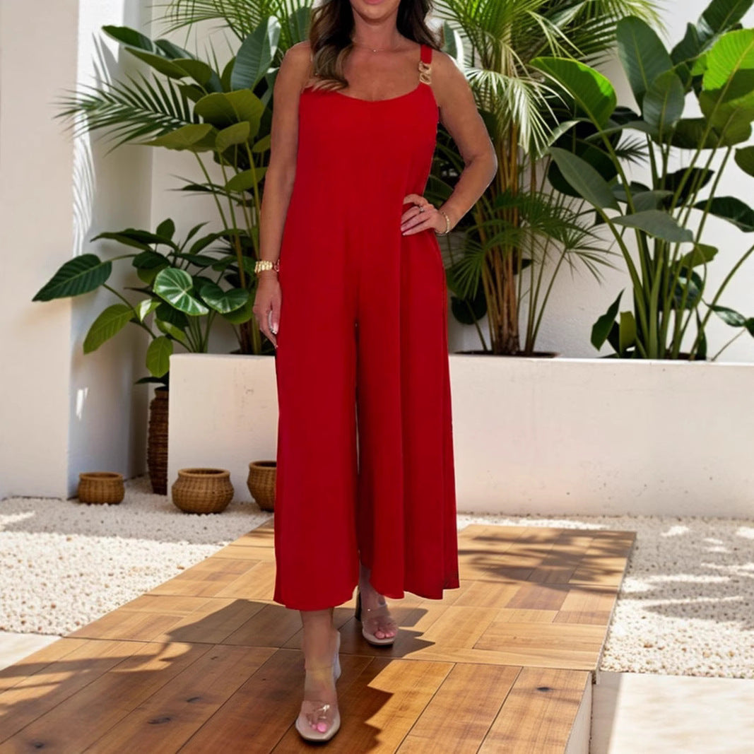 Dame luftig jumpsuit med smal pasform og modige accenter Stilla