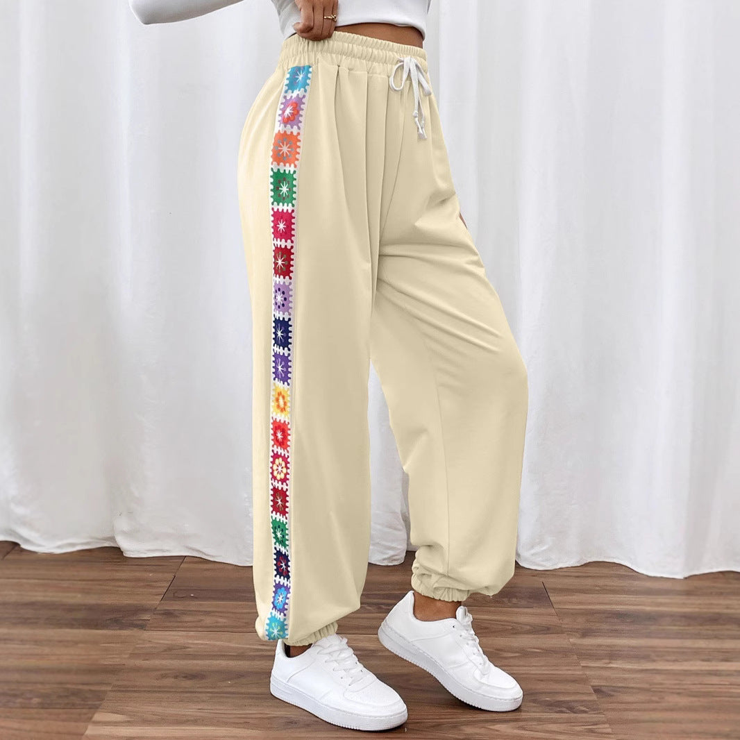 Dame joggingbukser med floral sidebånd Stilla