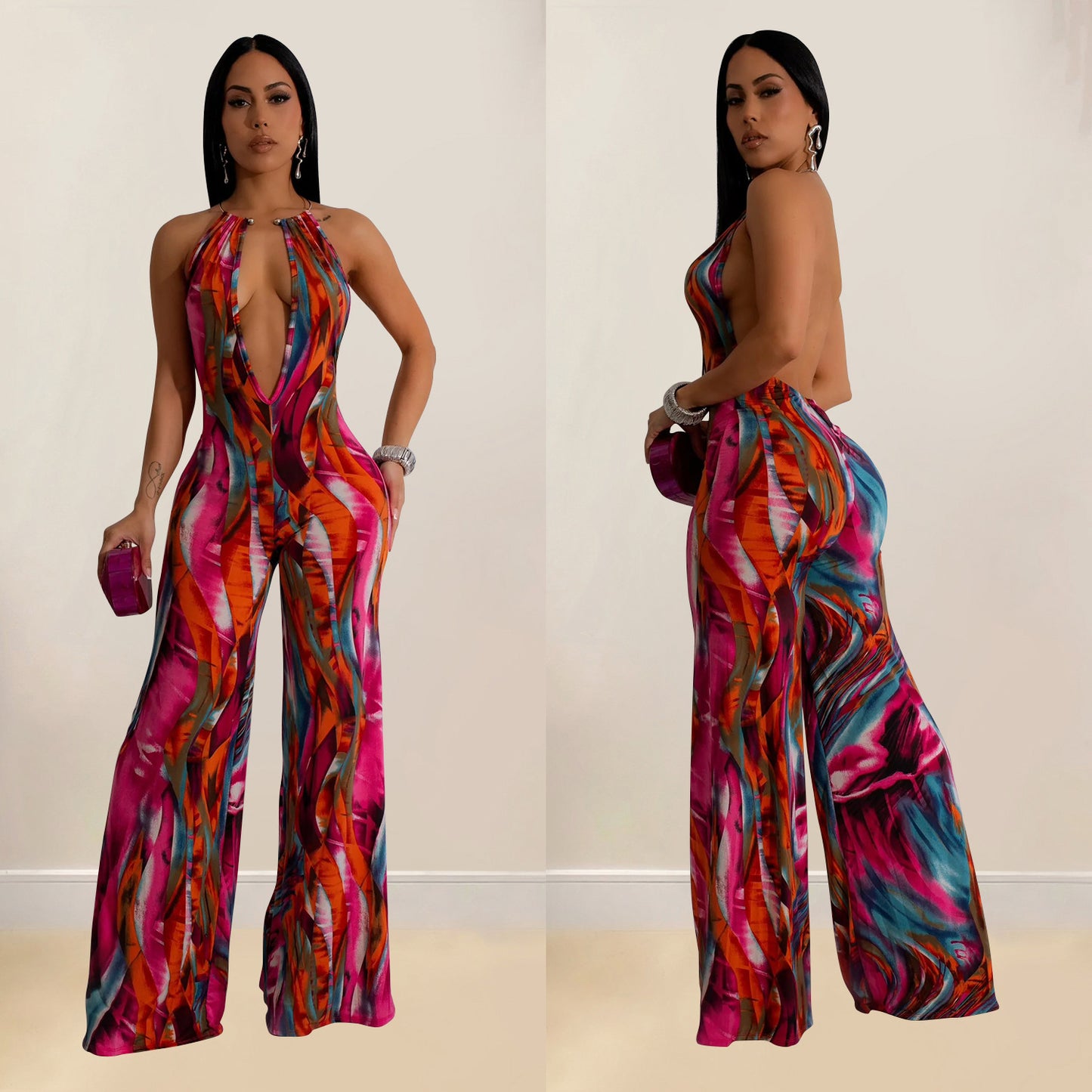 Dame Riviera-inspireret jumpsuit med dyb udskæring og bredt ben Stilla