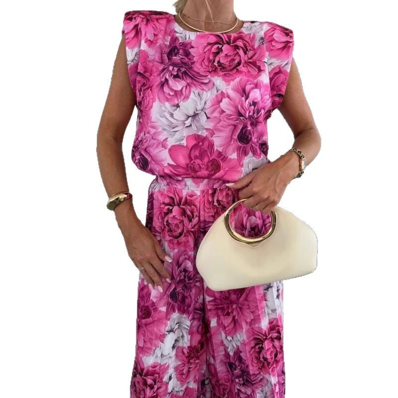 Dame jumpsuit med blomsterdesign og skulderpuder Stilla