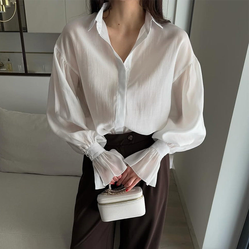 Dame Elegant Bluse med voluminøse Puffærmer og fint Strukturdesign Stilla