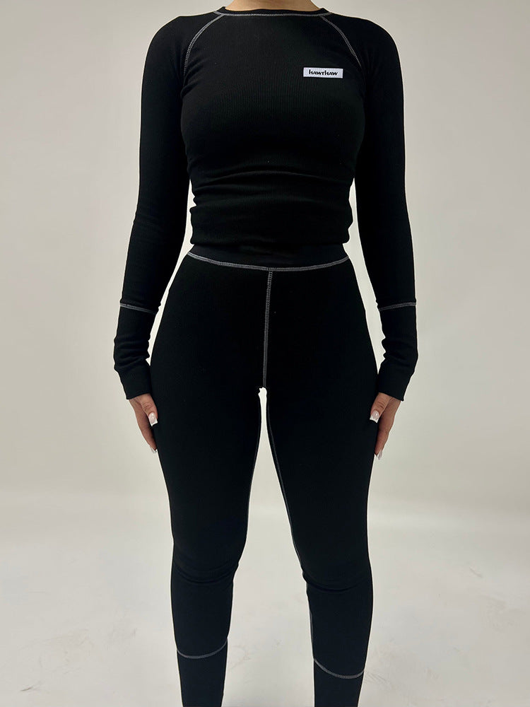 Dame leggings-sæt med langærmet top og figurskabende design Stilla