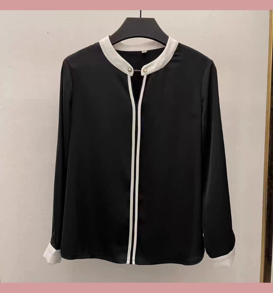 Dame elegant bluse med kontrasterende krave og knapdetaljer Stilla
