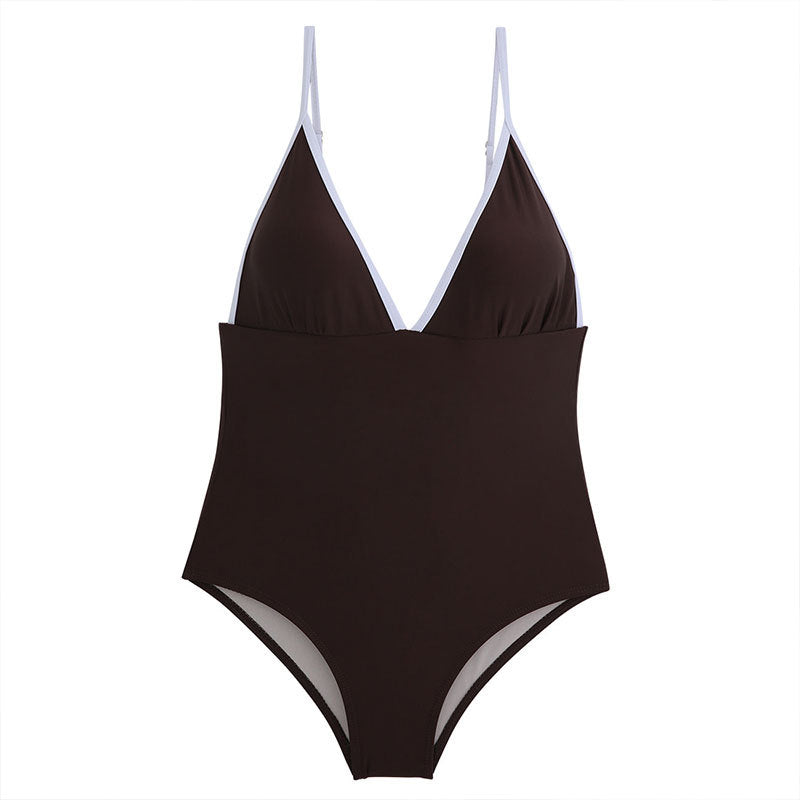 Dame elegant ensfarvet badedragt med moderigtige farvekontraster og dyb V-udskæring Stilla