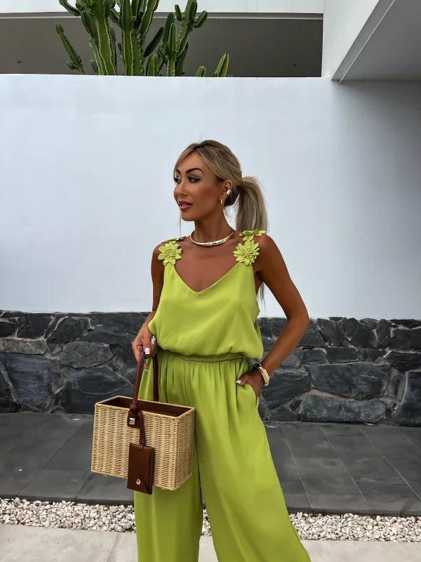 Dame løst skåret jumpsuit med floralt accent og elastisk talje Stilla