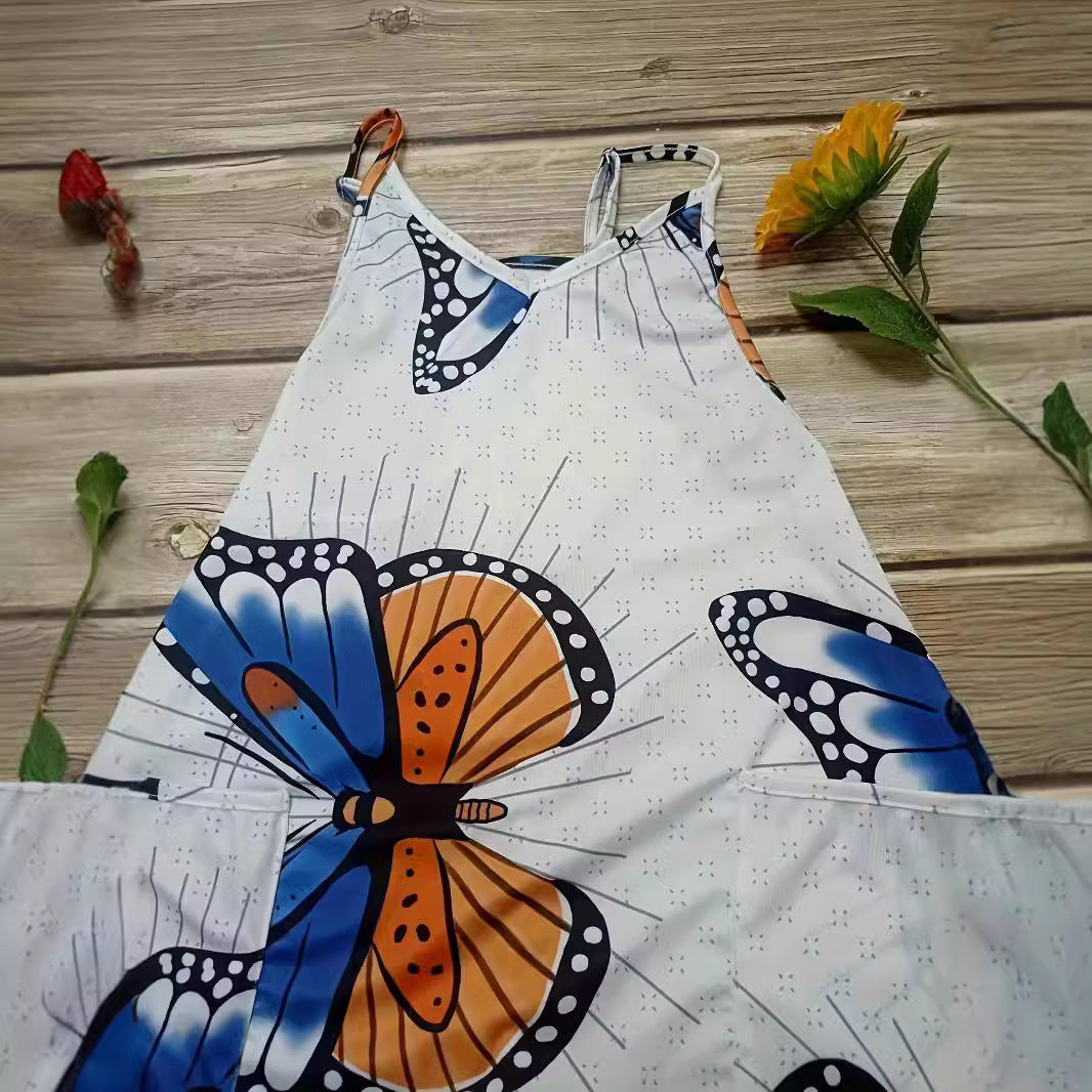 Dame jumpsuit med iøjnefaldende sommerfugledesign og praktiske lommer Stilla