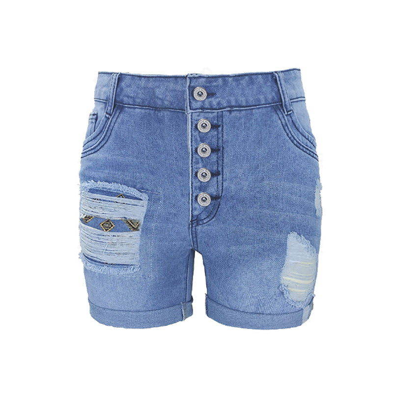 Dame denim-shorts med moderne ripped-design og farverige indlæg Stilla