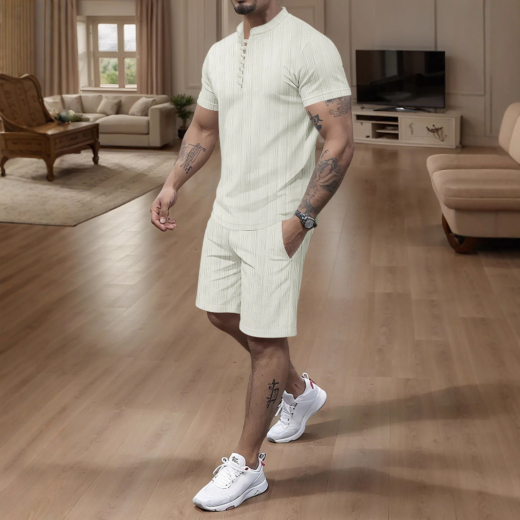 Herrer moderne kortærmet jumpsuit med knapåbnet ståkrave og struktureret design Stilla