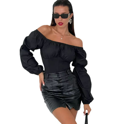Dame Off-Shoulder Bodysuit med voluminøse ærmer og tætsiddende snit Stilla