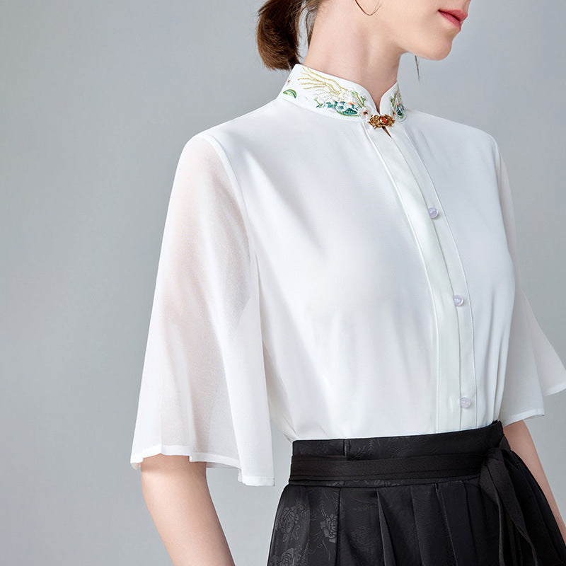 Dame elegant bluse med blomsterbroderier og gennemsigtige ærmer Stilla