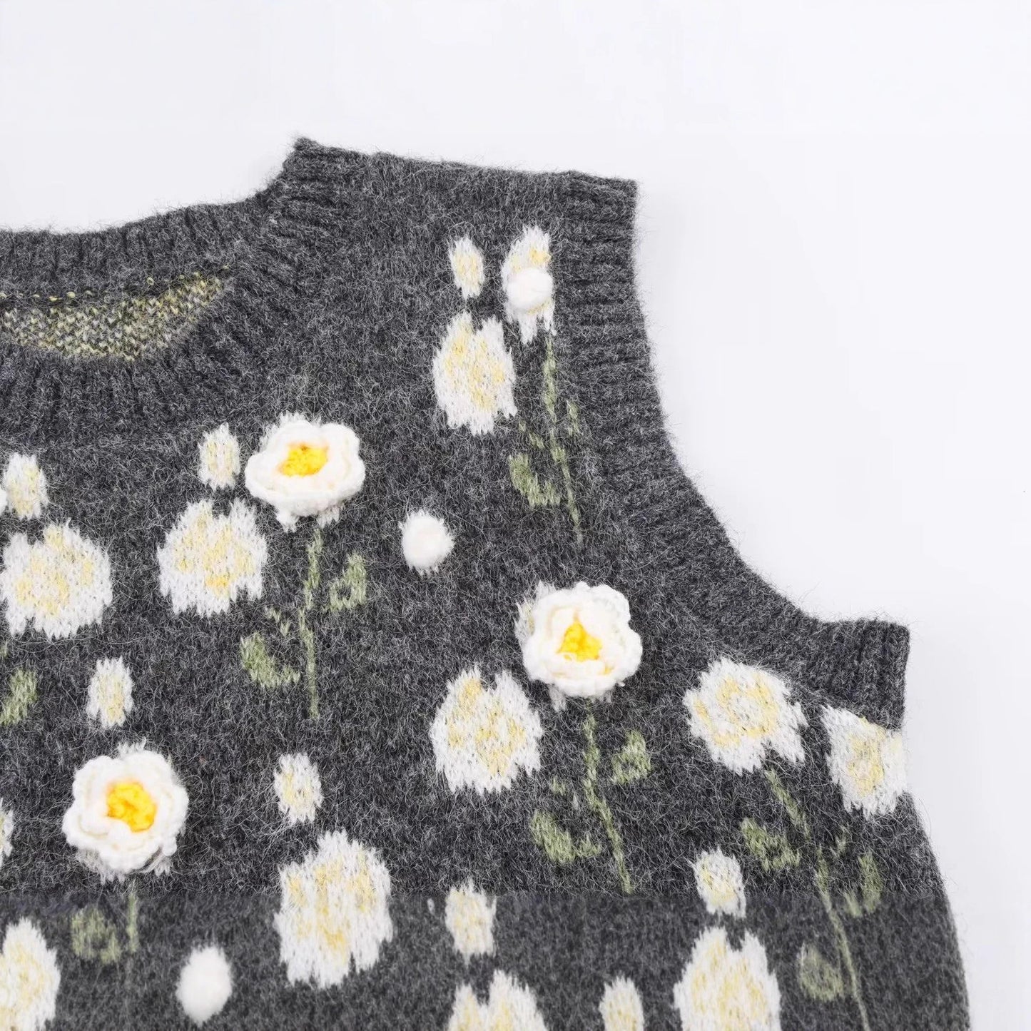 Dame strikvest med florale applikationer Stilla