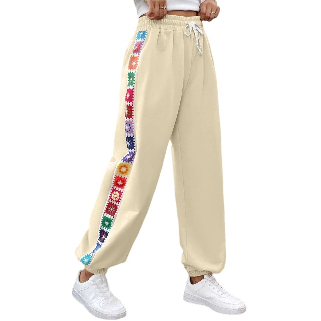 Dame joggingbukser med floral sidebånd Stilla