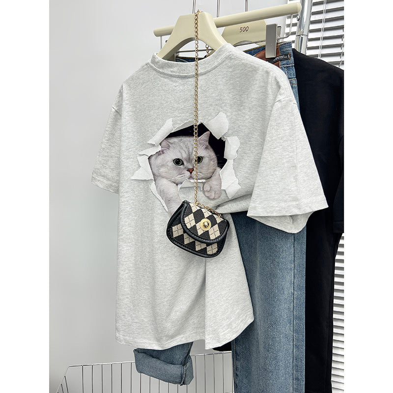 Dame T-shirt med kreativt kattemotiv gennem gennemboret væg Stilla