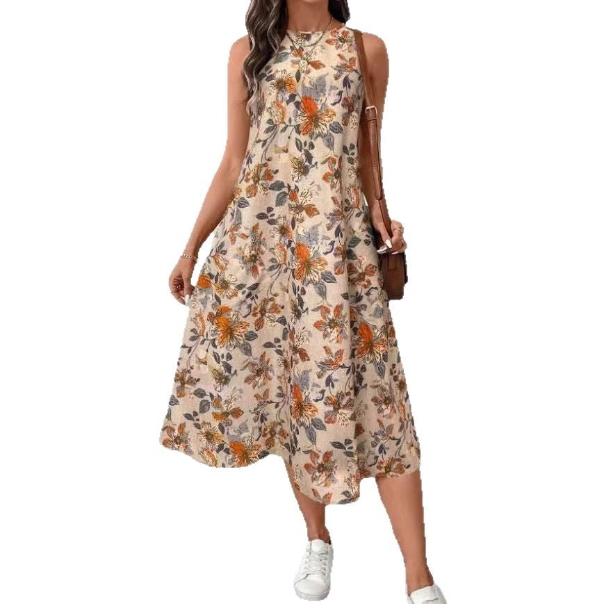 Dame afslappet blomsterkjole med lommer og svajende kant Stilla