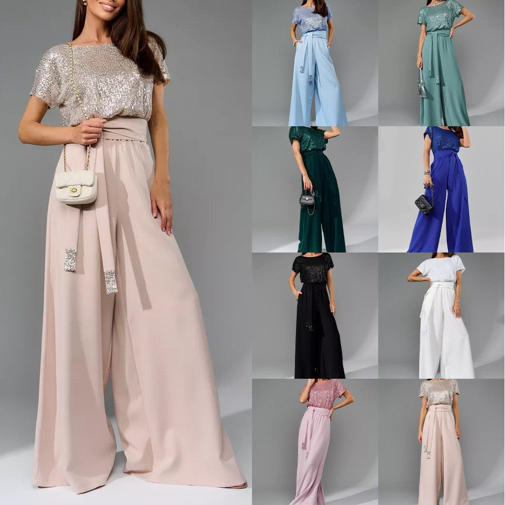Dame Glitrende Jumpsuit med bredt ben og taljebælte Stilla