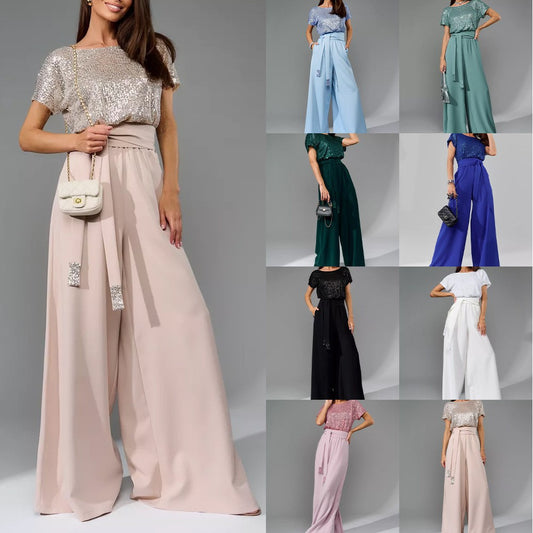 Dame Glitrende Jumpsuit med bredt ben og taljebælte Stilla