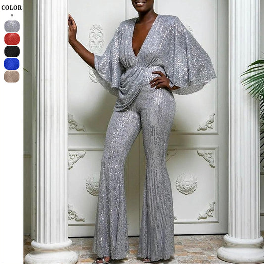 Dame glamourøs jumpsuit med glitrende paletter og vidde ben Stilla