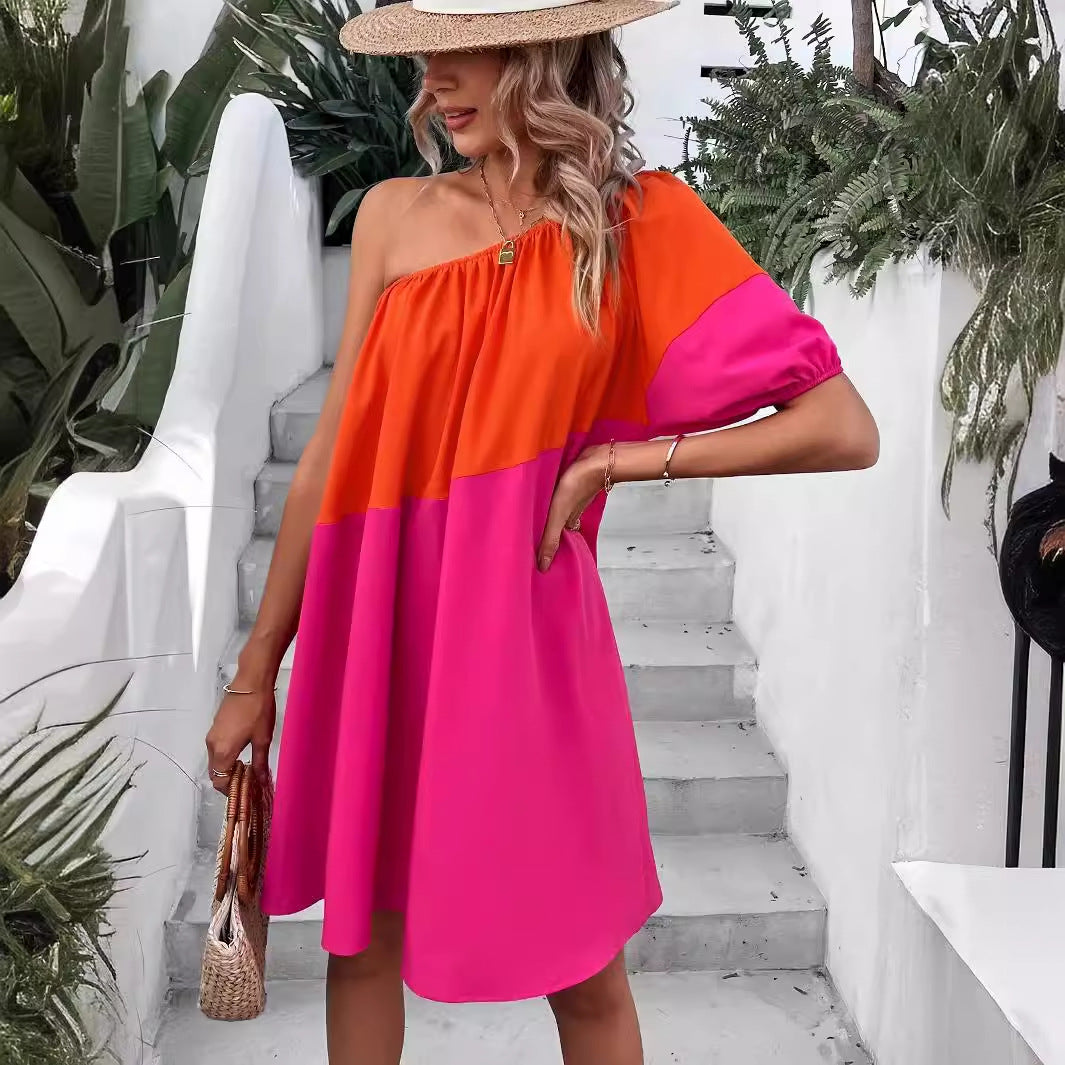 Dame afslappet asymmetrisk sommerkjole med en-sidig stropp og farverigt blokdesign Stilla