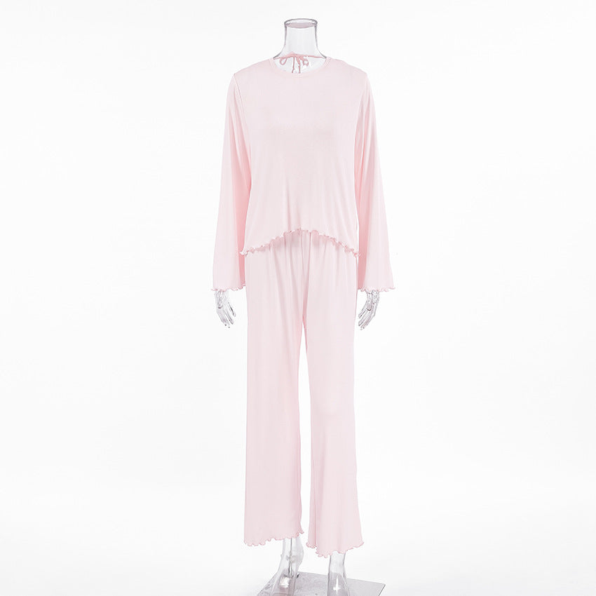 Dame afslappet pyjamasæt med flæsedetaljer og åndbart stof Stilla