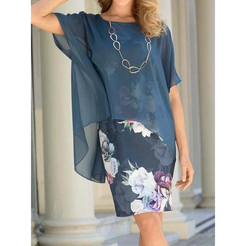 Dam chiffonkjole med blomsterdesign og flydende silhuet Stilla