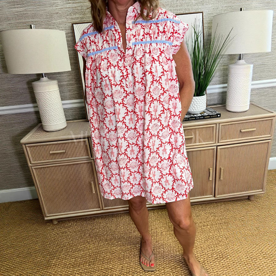 Dame afslappet strandkjole med blomsterdesign og knapfrit design Stilla