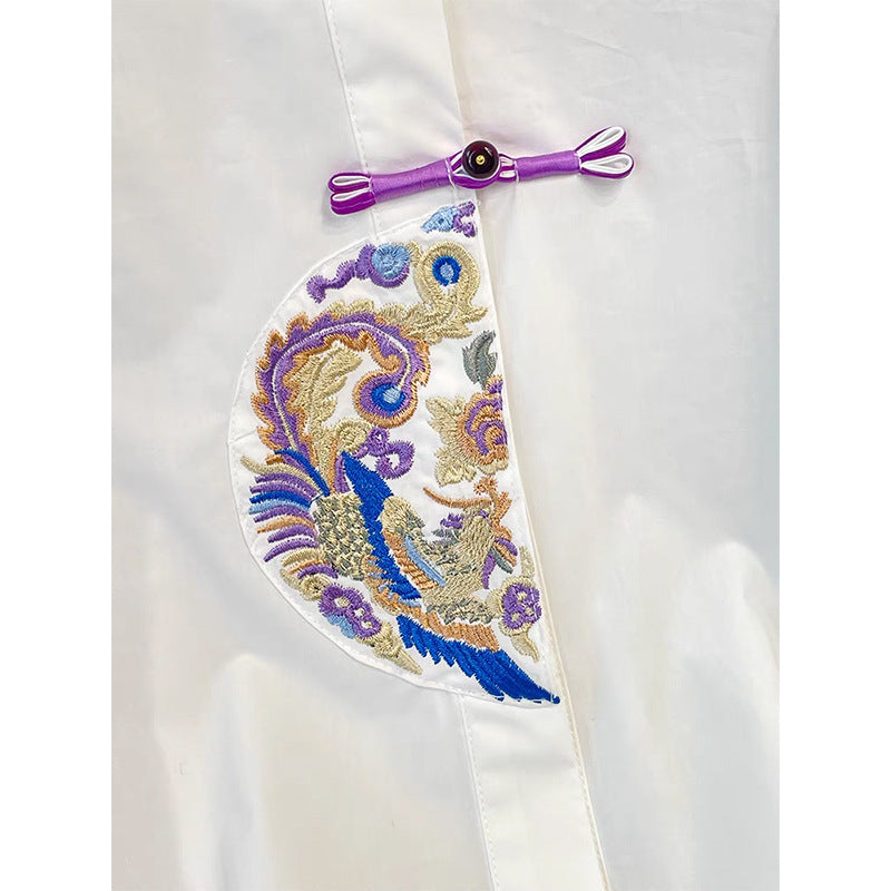 Dame eksklusiv langærmet bluse med kunstnerisk broderedesign og moderne accenter Stilla