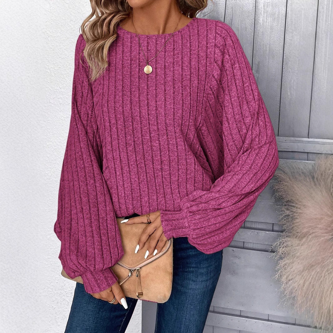 Dame sweater med elegante ballonærmer og ribbestruktur Stilla
